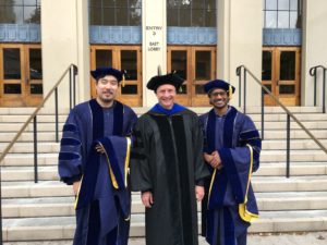Graduates Jonathan Jui (left) and Shariq Mobin (right) are pictured with PhD Program Director Michael Silver (center).