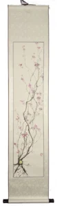 A hanging scroll with a painting of a gray-black neuron with a gold nucleus, and pink flower blooms on its branches. The background is beige. The body of the neuron is towards the bottom, and its long branches extend upwards like a tree.